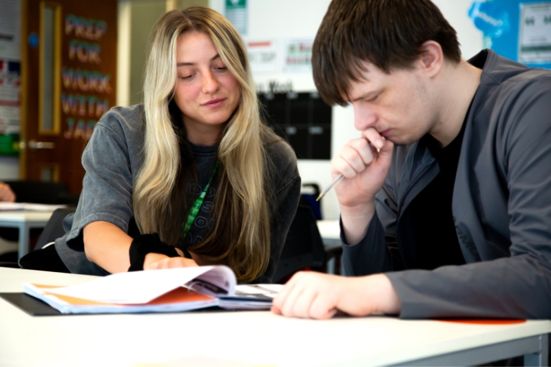 two people gardening in the sunshine