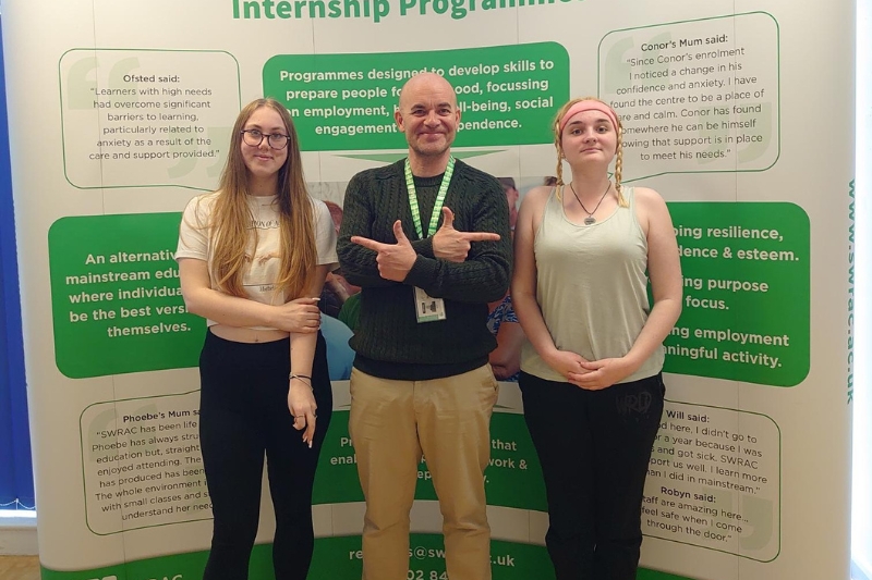 someone sanding a wooden post